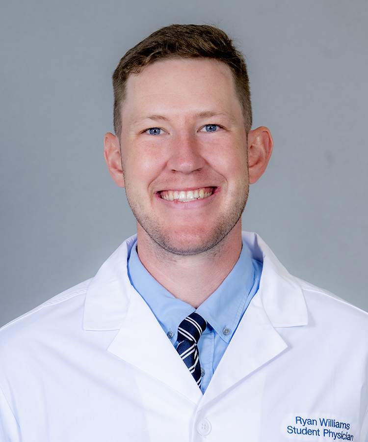 ryan williams headshot image in front of gray backdrop