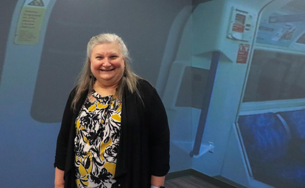 Dr. Cheryl Scott demonstrates an Immersion Room at BHSU