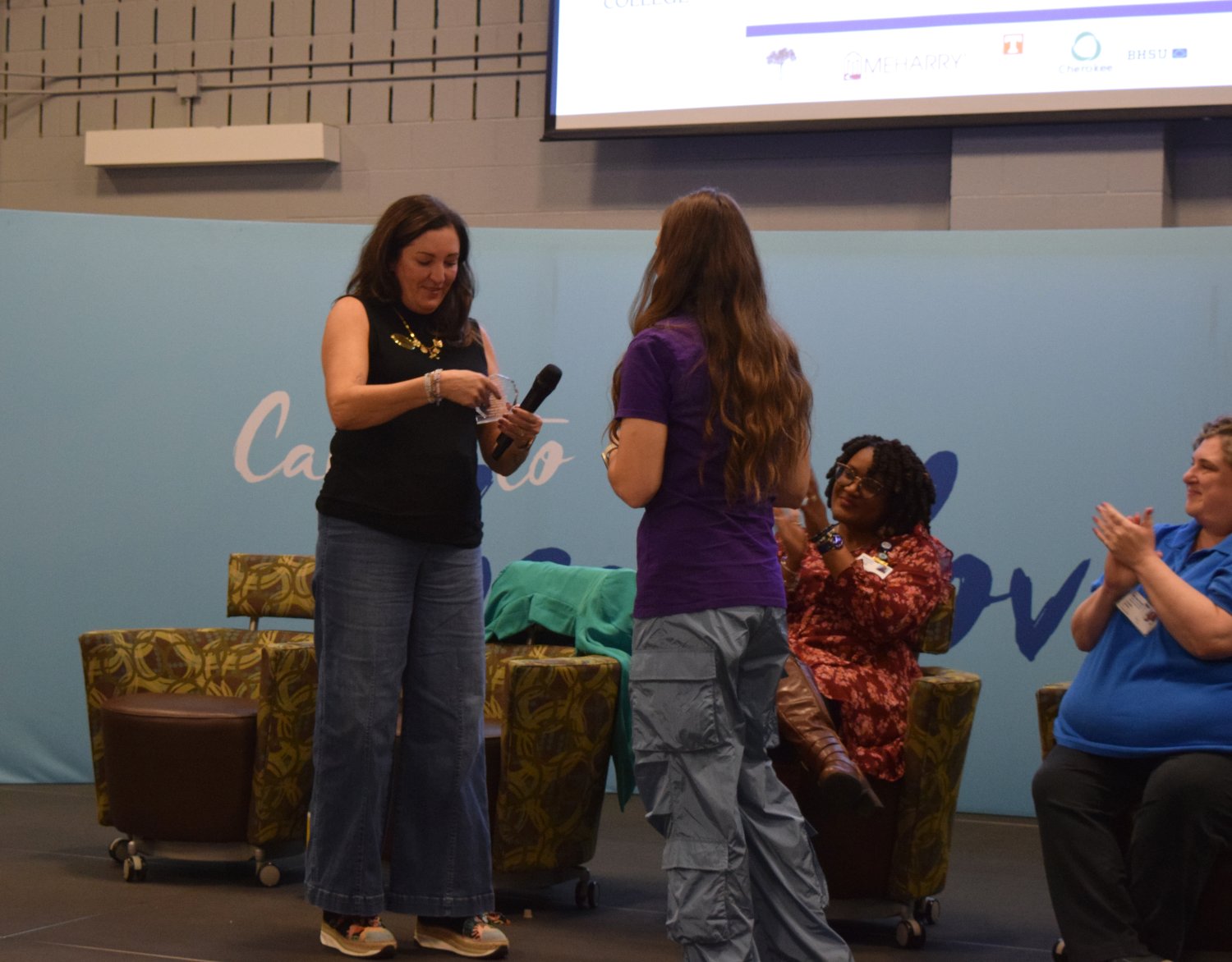 a panelist receiving an award