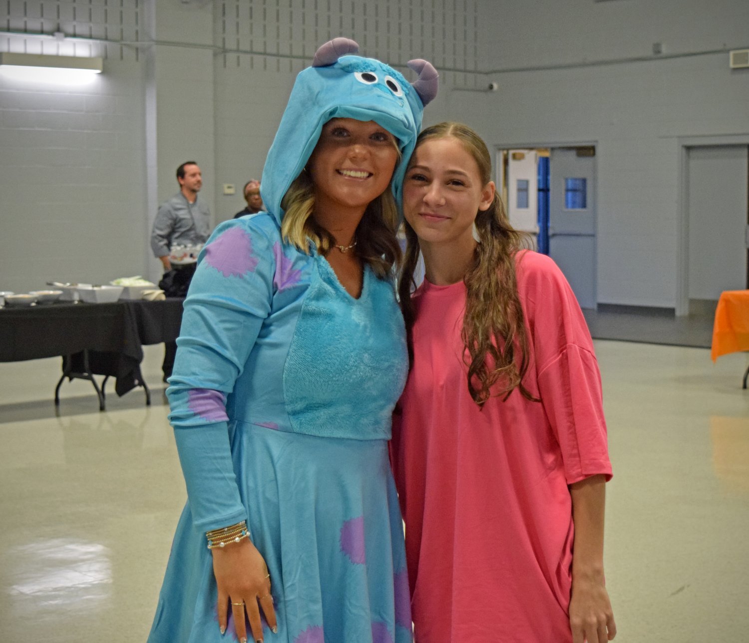 2 students dressed in costumes