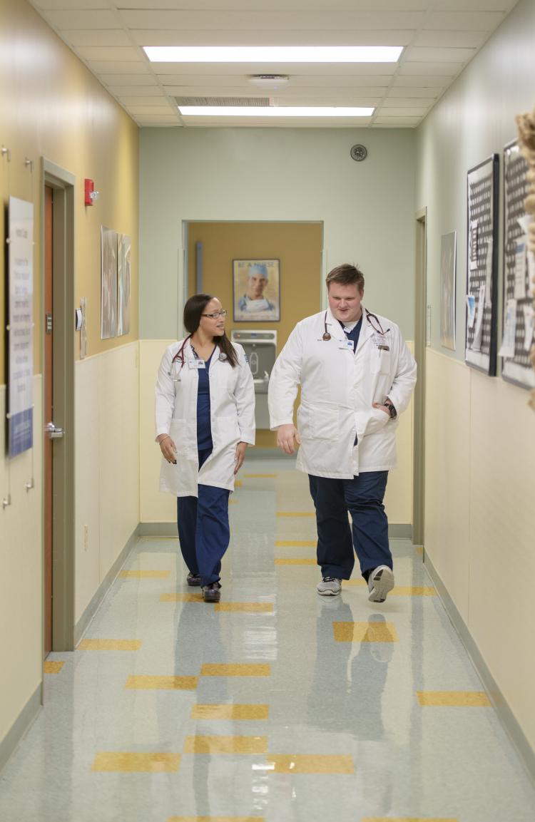 DNP students walking in hallway