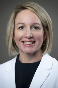 Headshot of Elly Riley, Assistant Dean of OMS-4