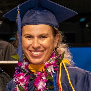 student at graduation headshot