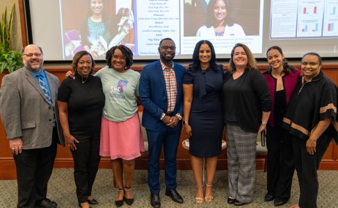 From left, Paul Criss, Mary Freeman, Lilian Nyindodo, Memphis Mayor Paul Young, Jamila Smith-Young, Briana Jegier, Tiana Poirier-Shelton and Cynthia Bradford.